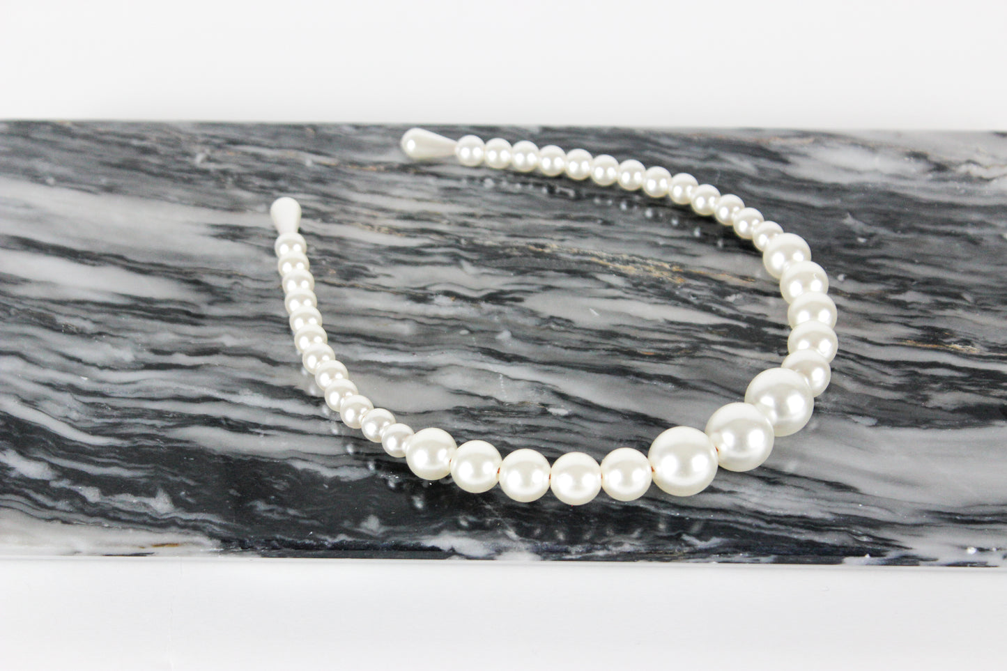 Diadema de perlas