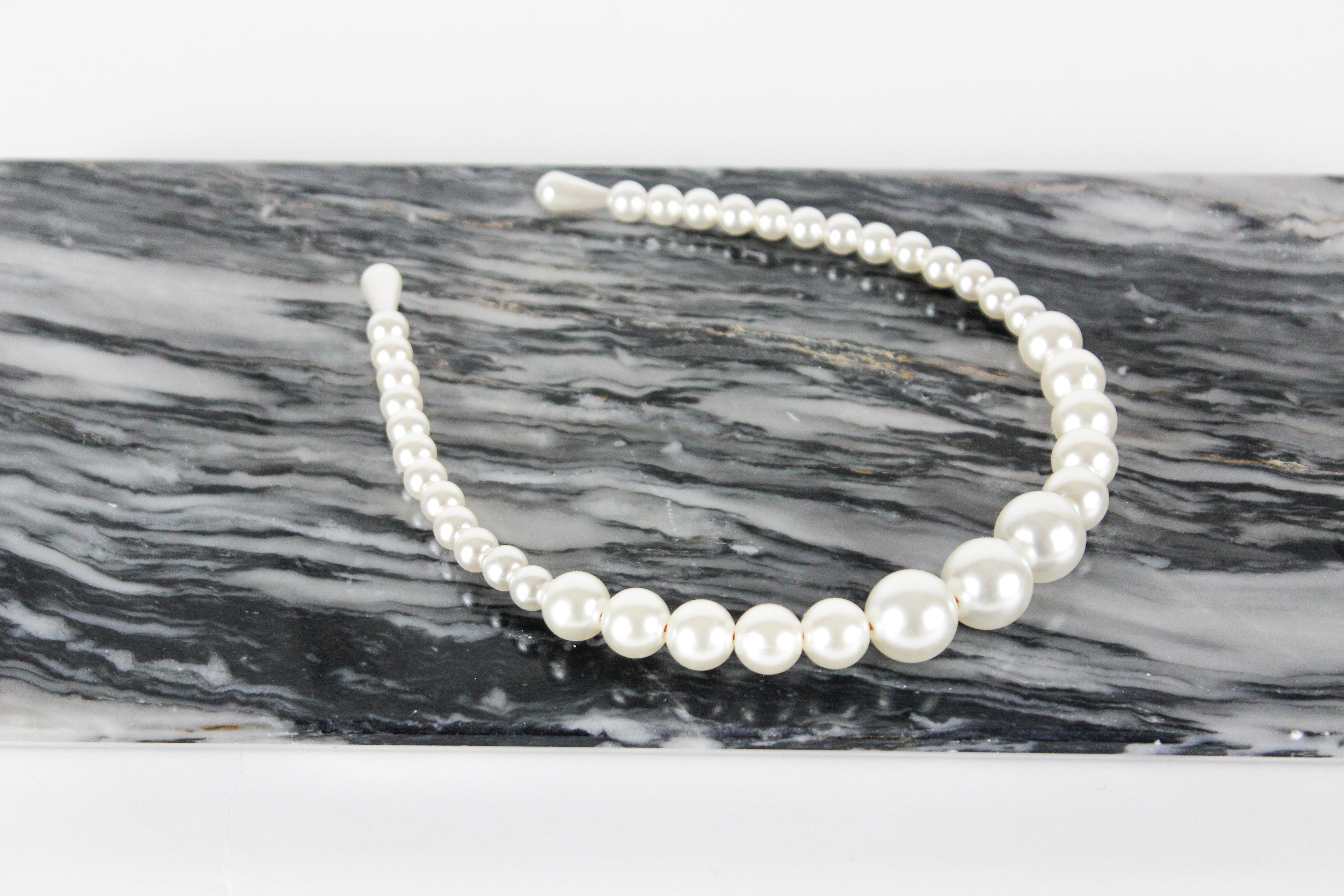 Diadema de perlas
